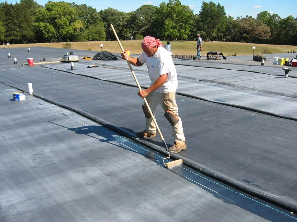 Snow and Ice Damage Insurance Claims for Flint Commercial Roofs